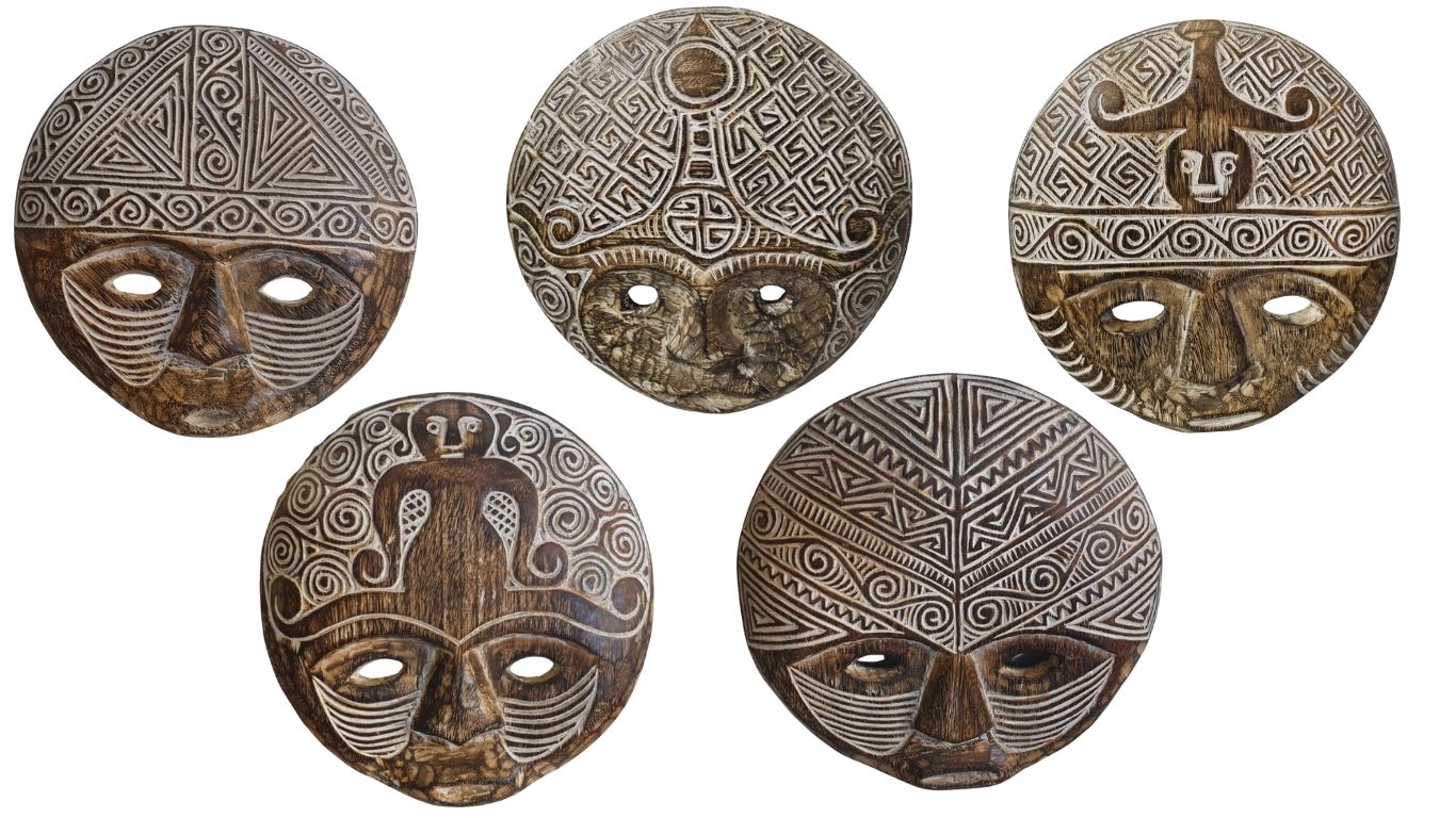 Set of five decorative masks with intricate designs on a white background