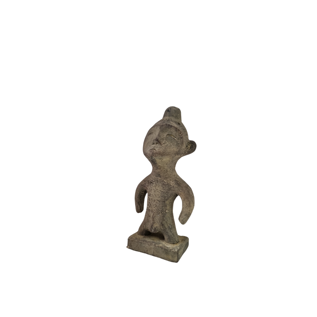Decorative statue of a stylized figure on a white background