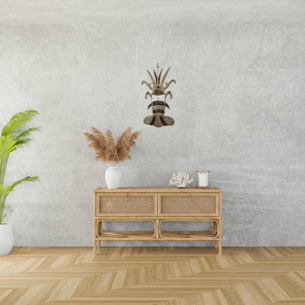 handcrafted design on the wall at level on a grey textured wall above a rattan console table styled with pampas grass, white ceramic vase, coral and candle on herringbone timber floor