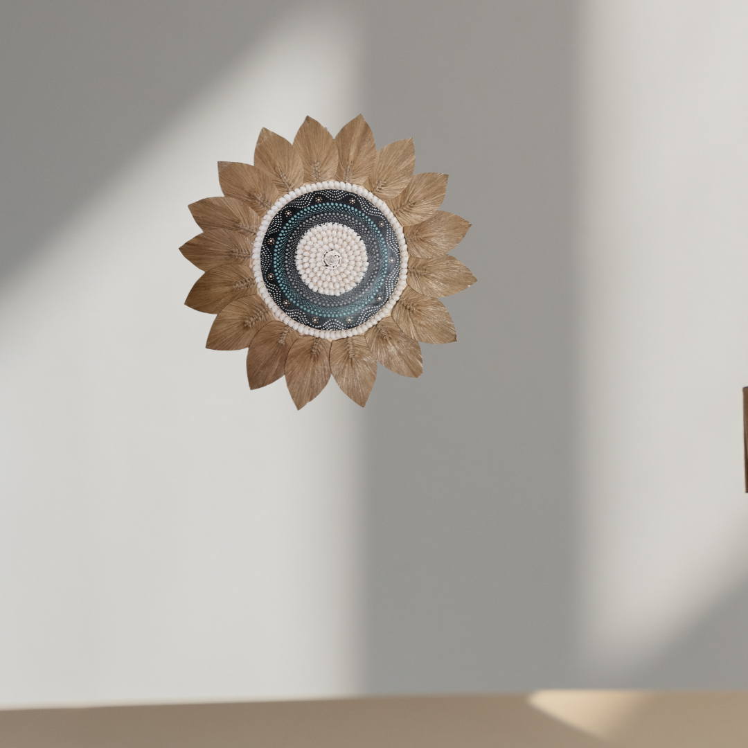 Tropical style shell and seagrass wall decoration with painted centrepiece