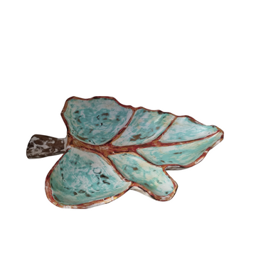 Handcrafted solid teak wood leaf dish with turquoise glaze, brown vein and edge detail and natural stem — top-down angle on white background