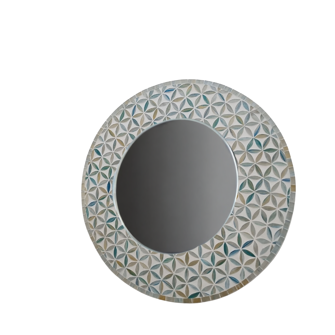 Round mirror with a decorative geometric frame on a white background