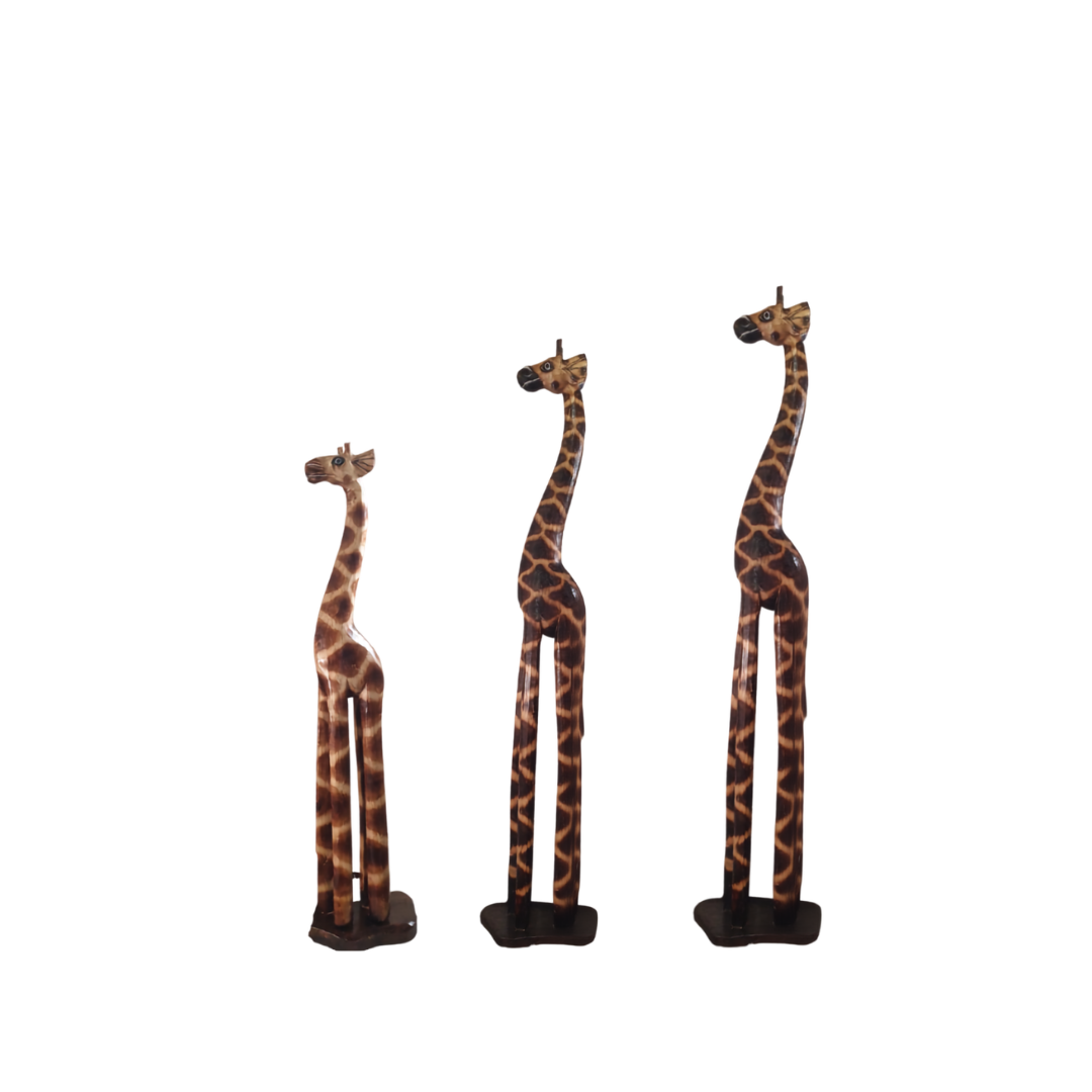 Three carved timber giraffe figurines standing side by side in small, medium and large sizes on a white background