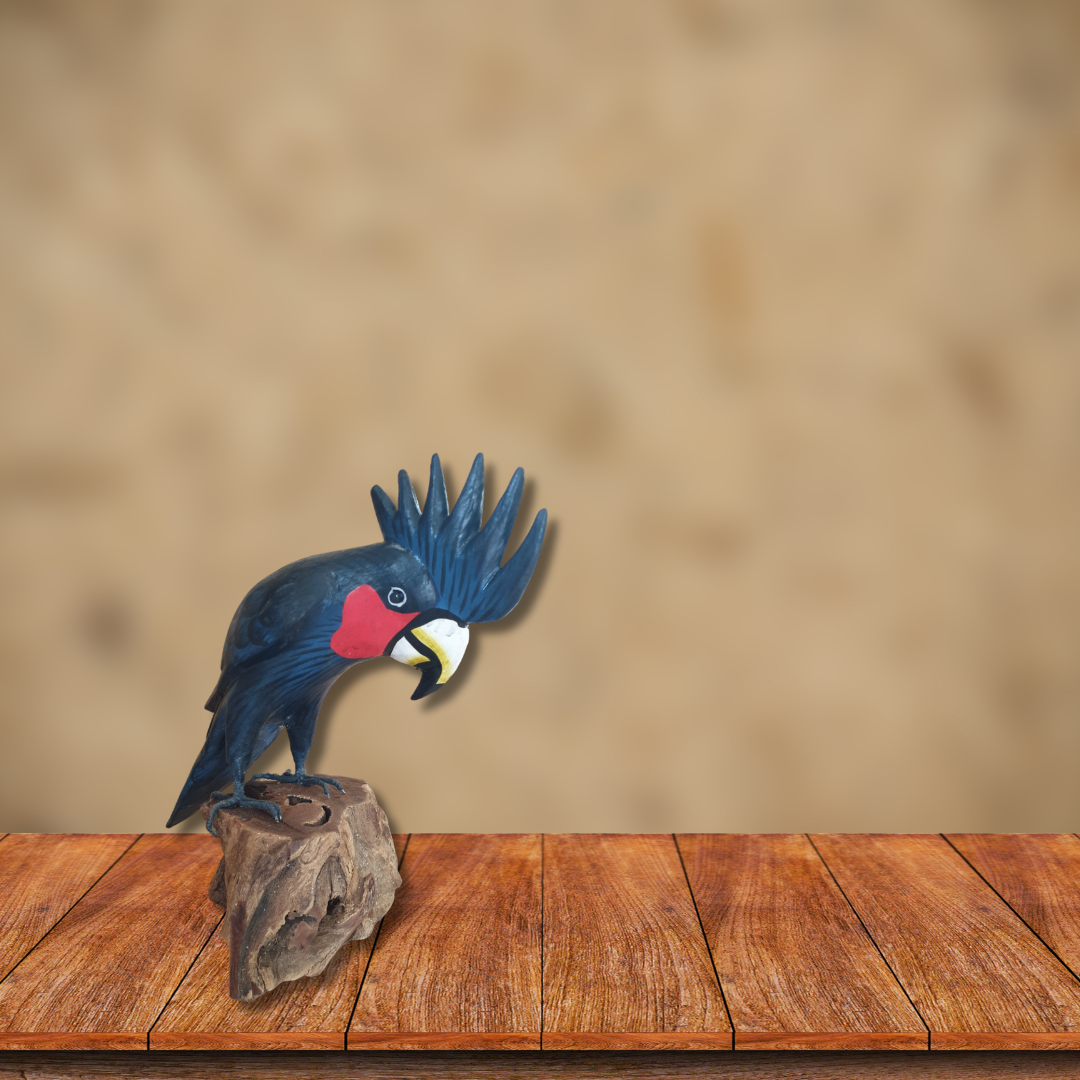 Colorful cockatoo figurine on a wooden platform with a beige background