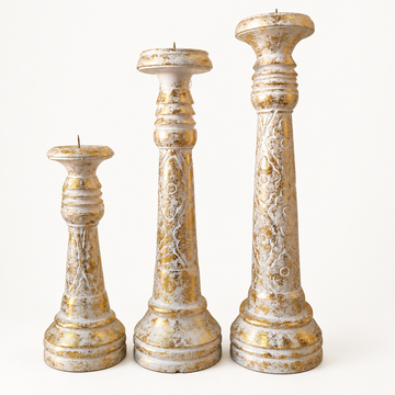  Gold wash wooden candle holders, set of three on a white backdrop