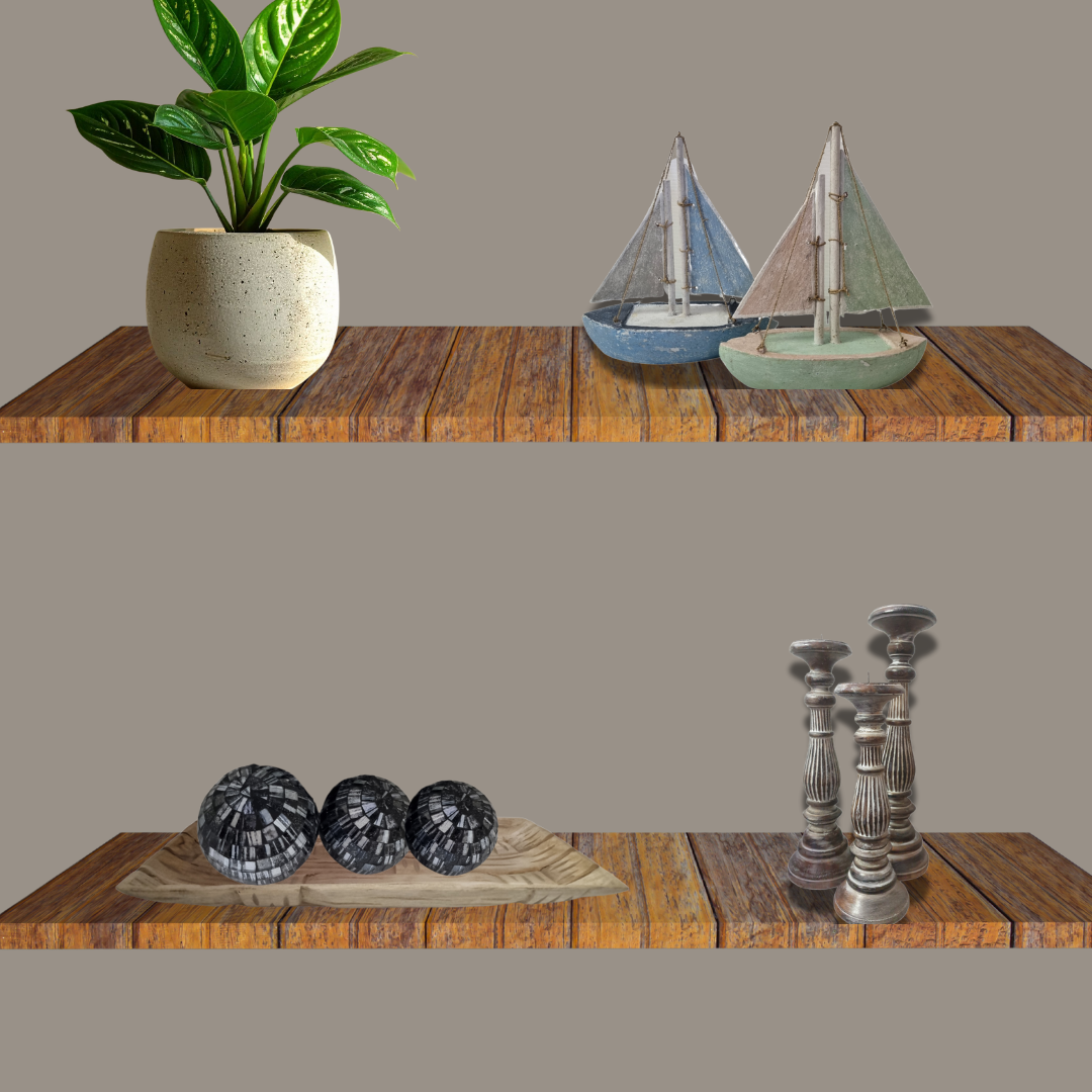 wooden shelf with plant and sailboats wooden bowl with mosiac balls and wooden candleholders