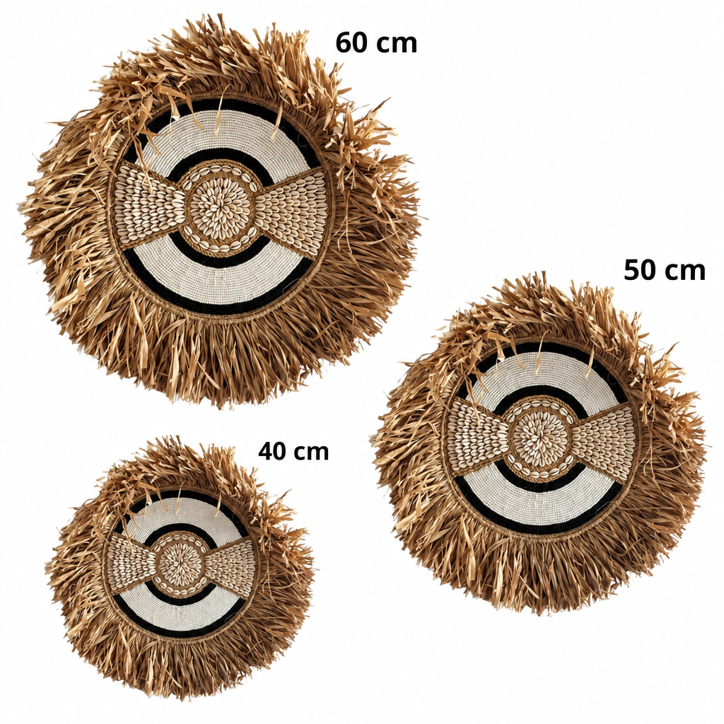 Three round woven decorative mats or rugs shown on a white background, labeled by size as 60 cm, 50 cm, and 40 cm. The mats have a natural straw-brown fringed edge, a cream woven center, and black circular accents.