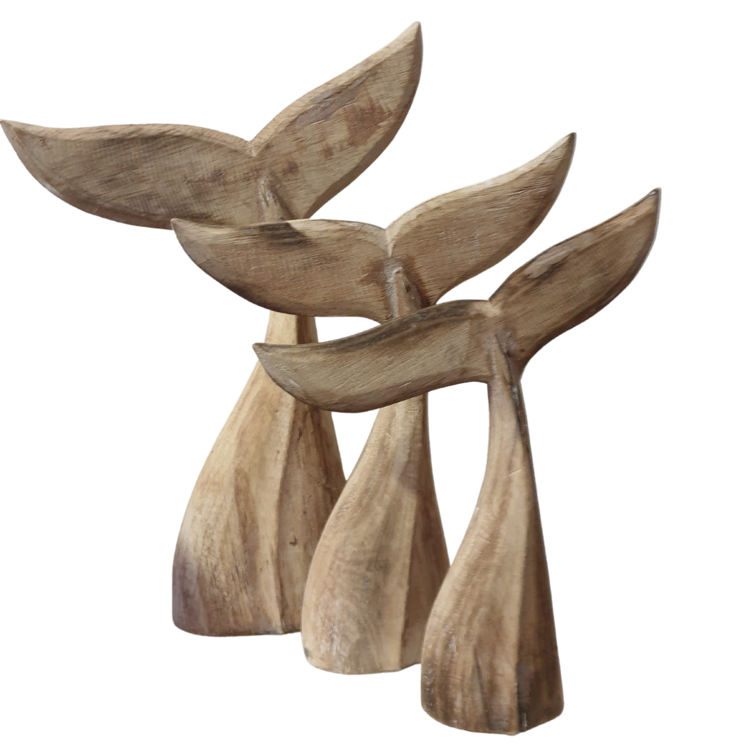 set of three whale tailson a white back ground 