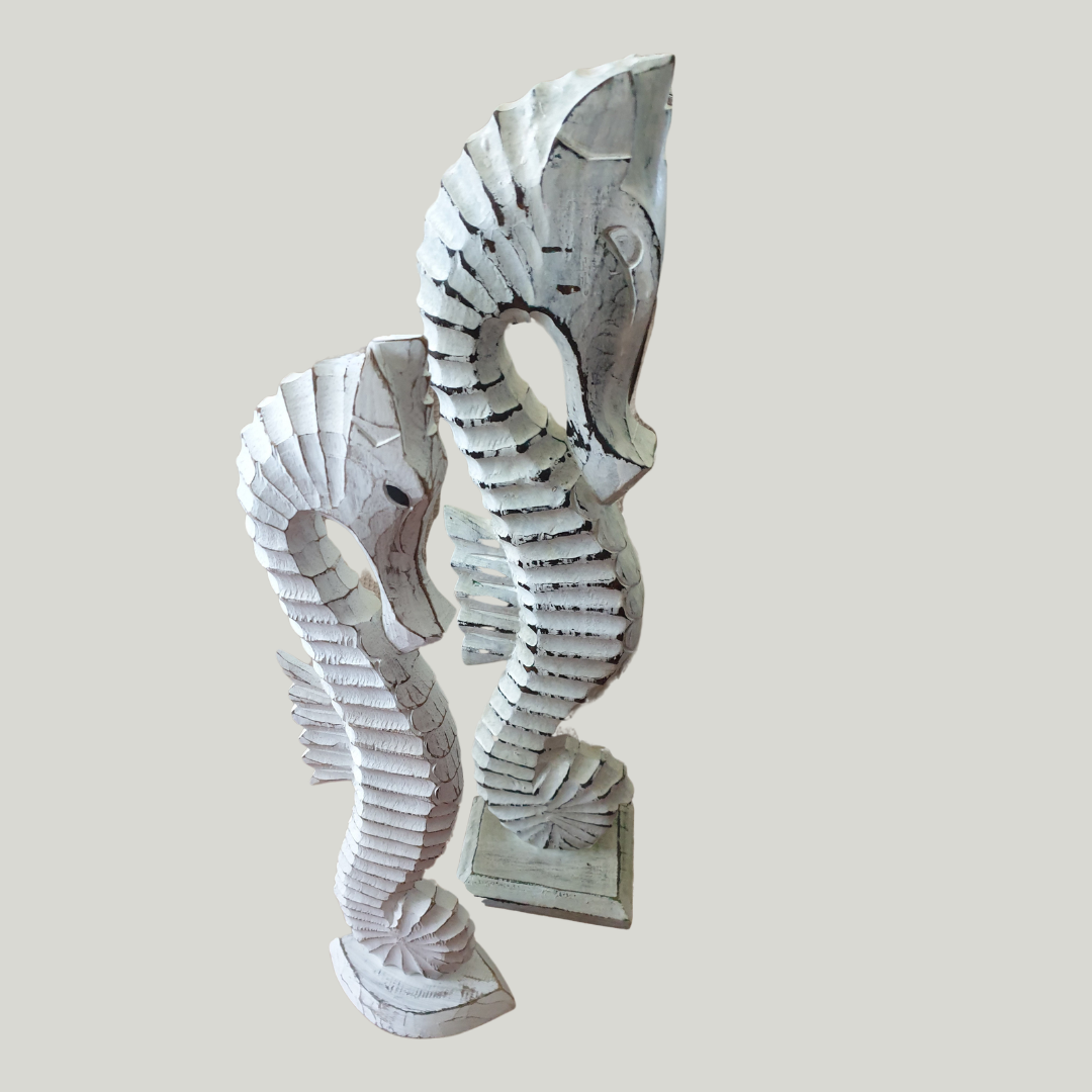 Decorative statues art of a seahorse on a plain background