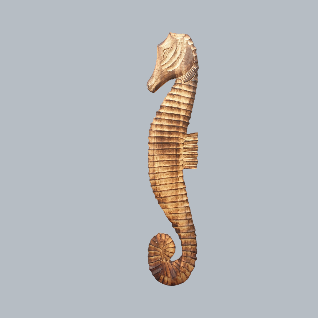 Wooden seahorse ornament on a gray background