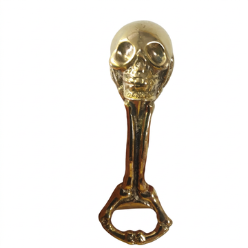 Front view held against a white background, showing deep eye sockets, detailed teeth and a bone-shaped handle.
