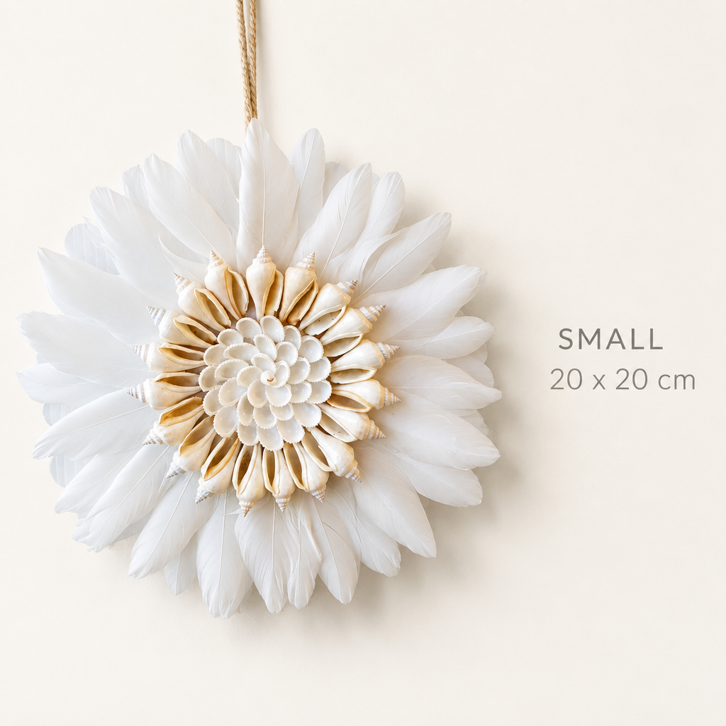 Small 20cm spiral shell wall hanging with a single ring of cone shells and white feathers