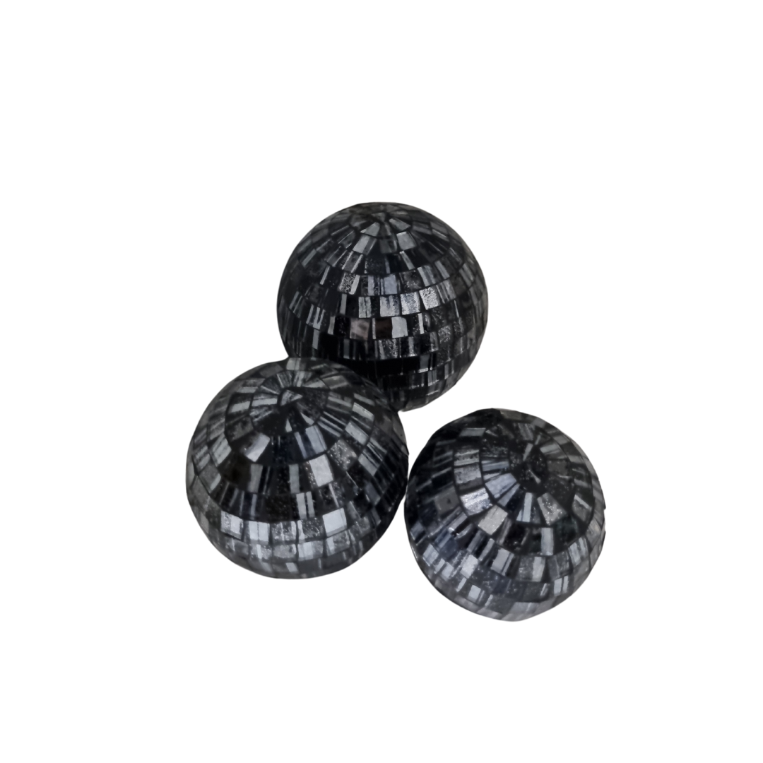 Three mosaic decorative balls in gray, each with a geometric pattern made of small tiles.
