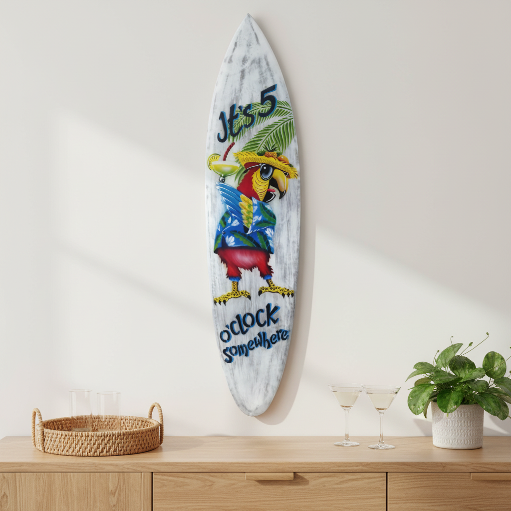 Whitewashed decorative board featuring a colourful parrot in a straw hat, mounted above a timber sideboard with cocktail glasses and a potted plant