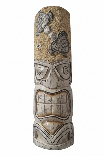 whitewashed timber with sand-textured headdress featuring two carved sea turtles, spiral eyes and wave scroll detail at the base