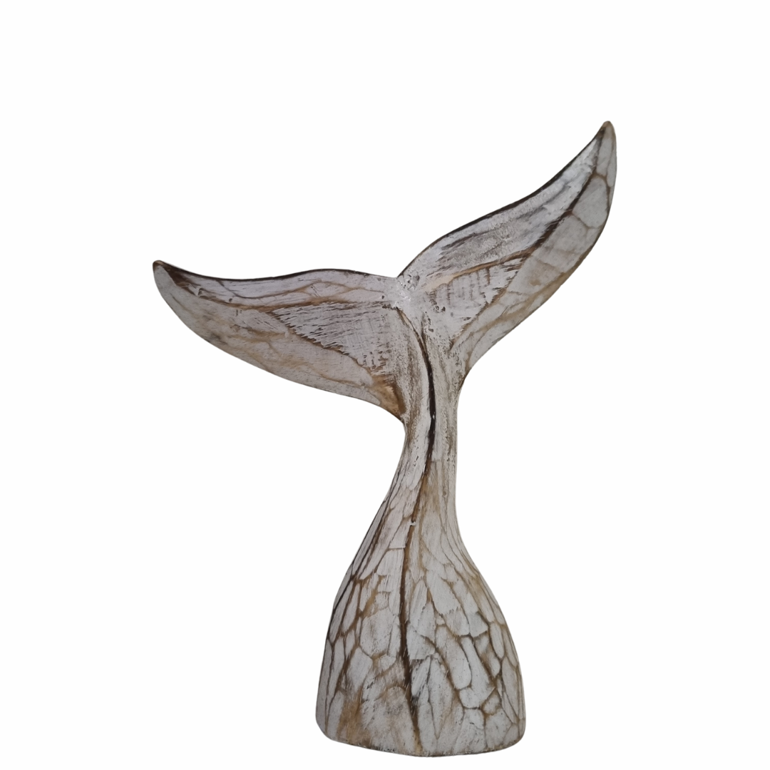 Decorative whale tail sculpture on a white background