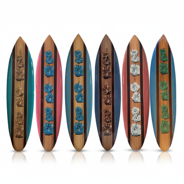 Six wooden surfboard wall art pieces with carved hibiscus flowers in teal, pink, blue, red and green