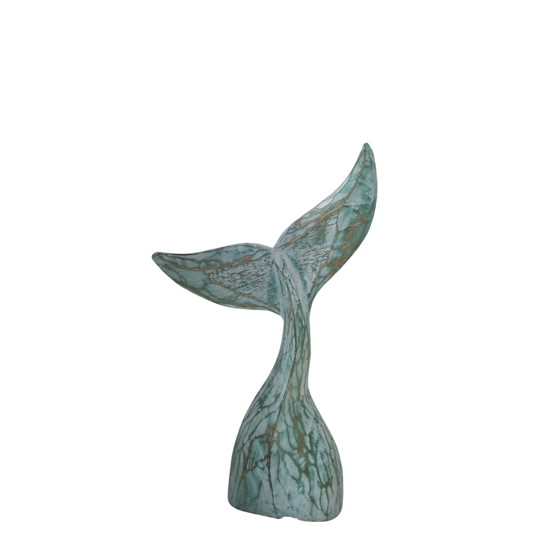 turquoise wooden whale tail n white backgrund