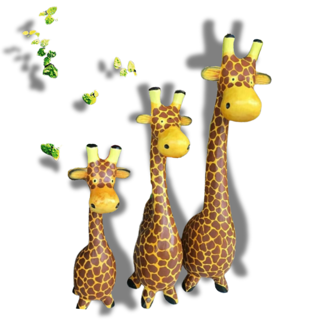 Three giraffe toys of different sizes on a white background
