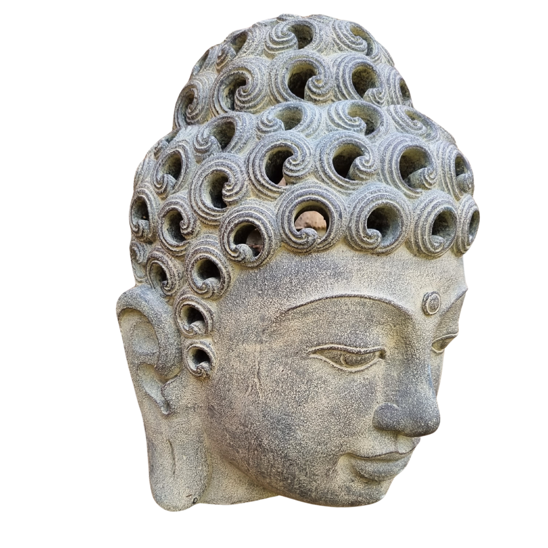side view of a silver-grey concrete wall ornament showing its textured surface, hollow decorative detailing and curved edges against a white background