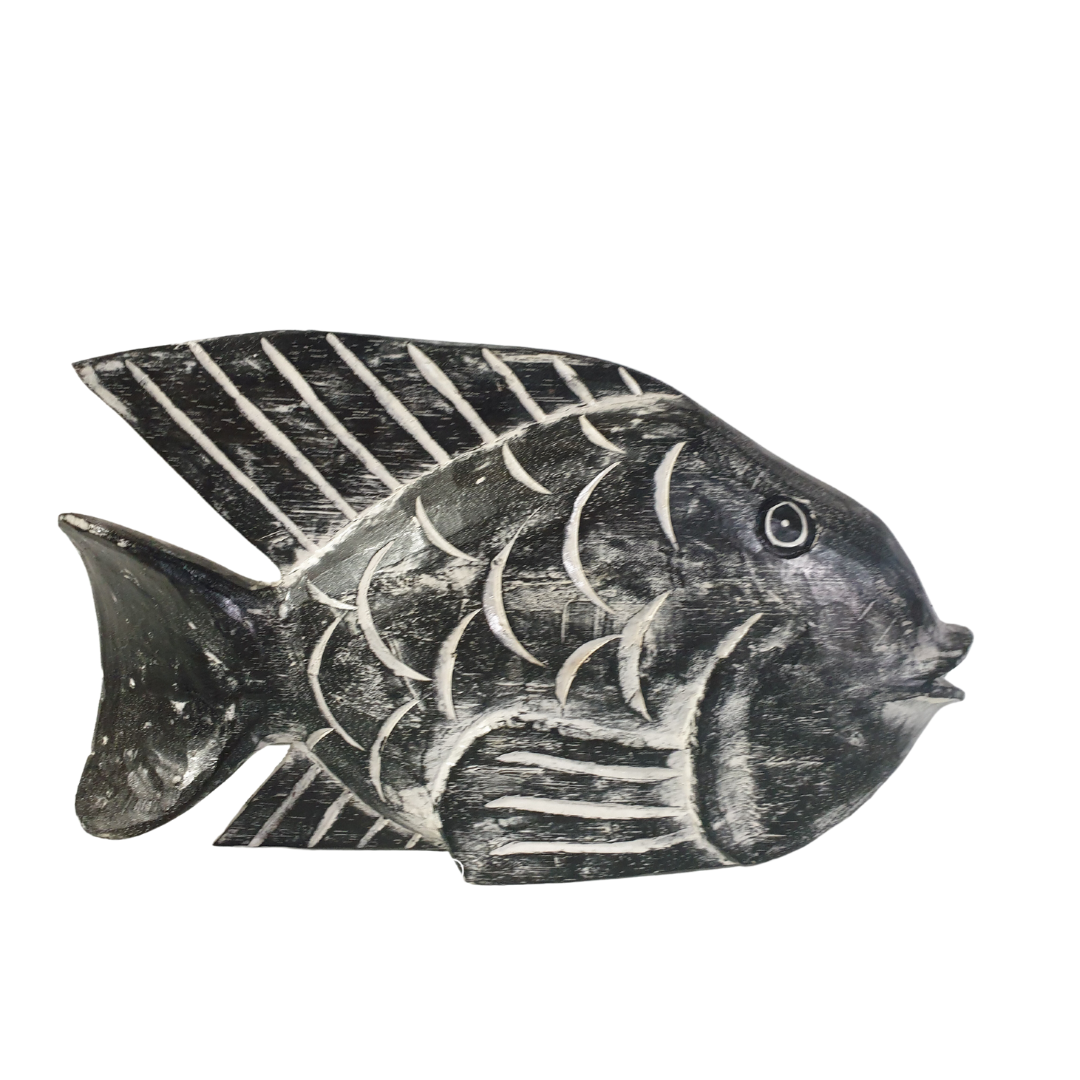 single black wooden carving set on a white background