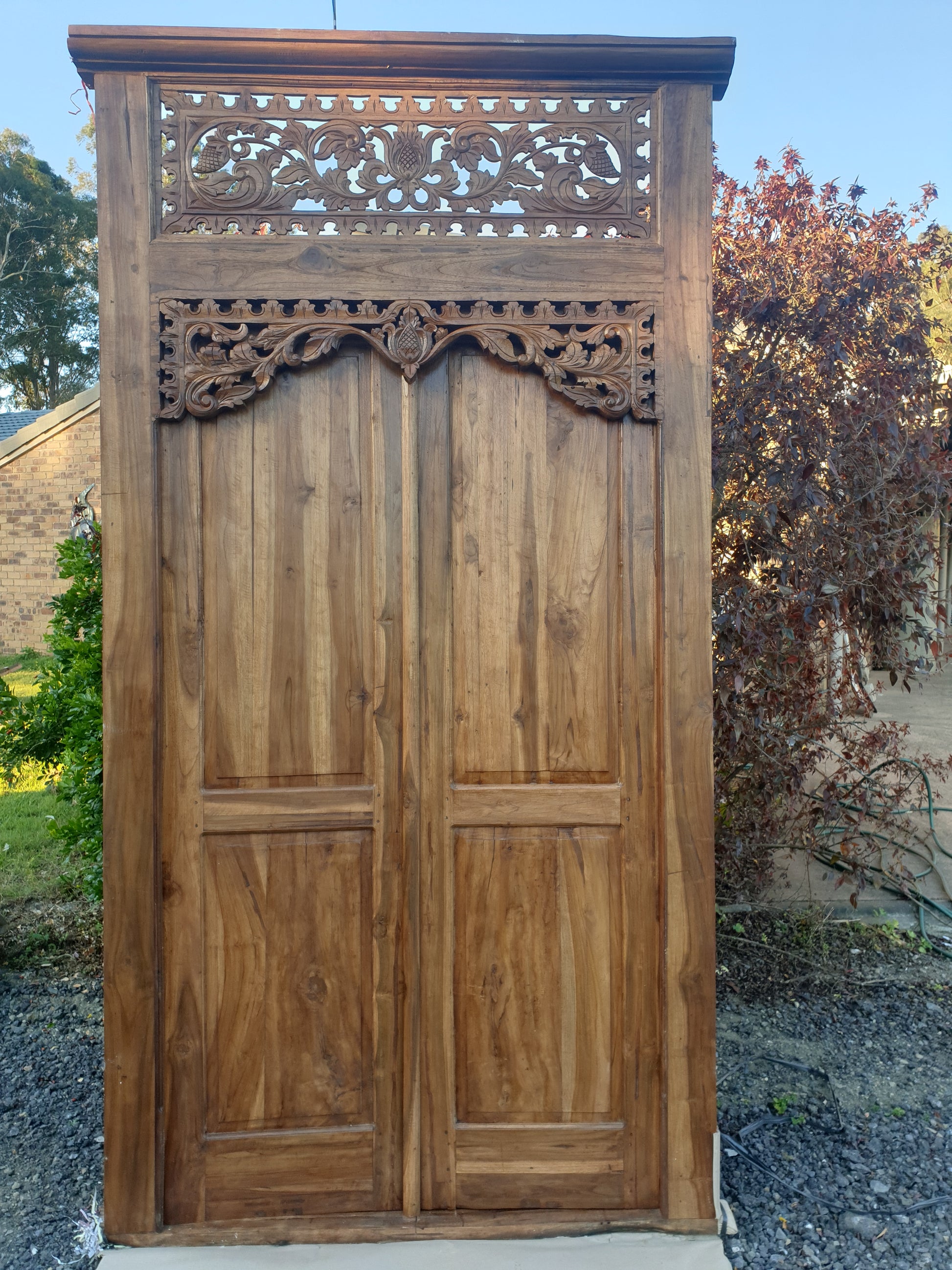 Doors Balinese Vintage Design set in a garden display 