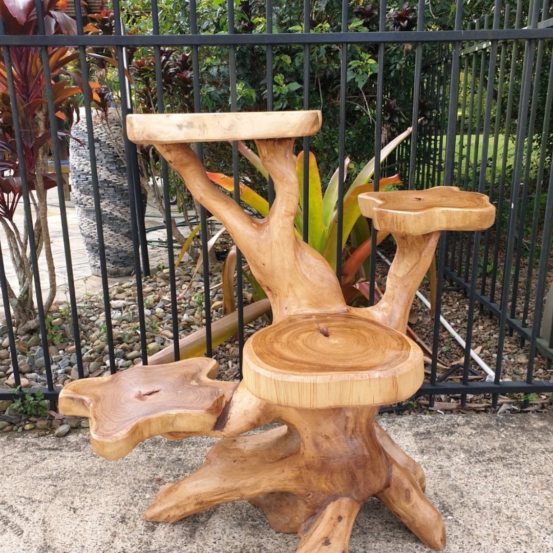 wooden stand infront of a fence