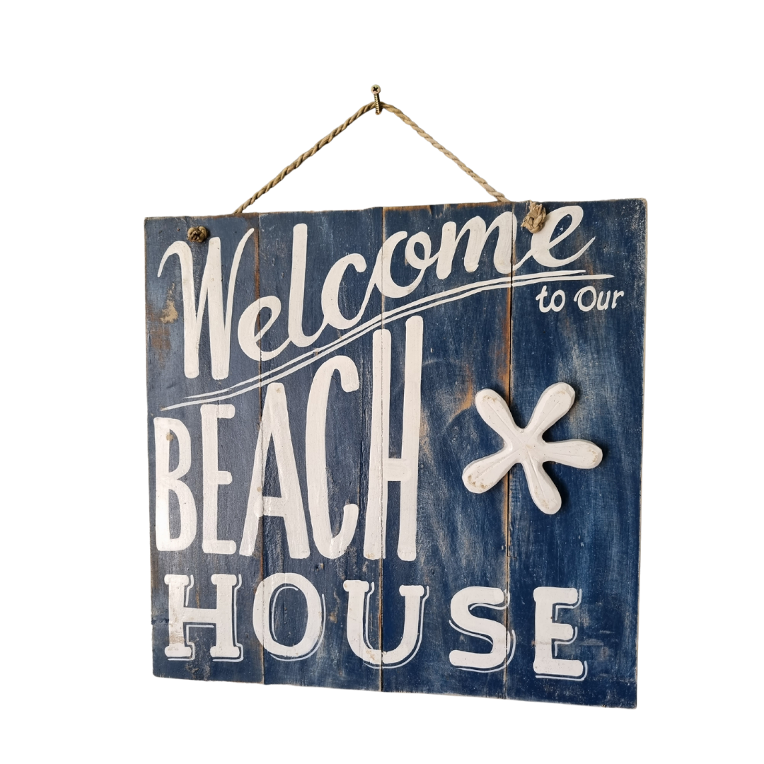 Blue wooden sign with white lettering set against a white background