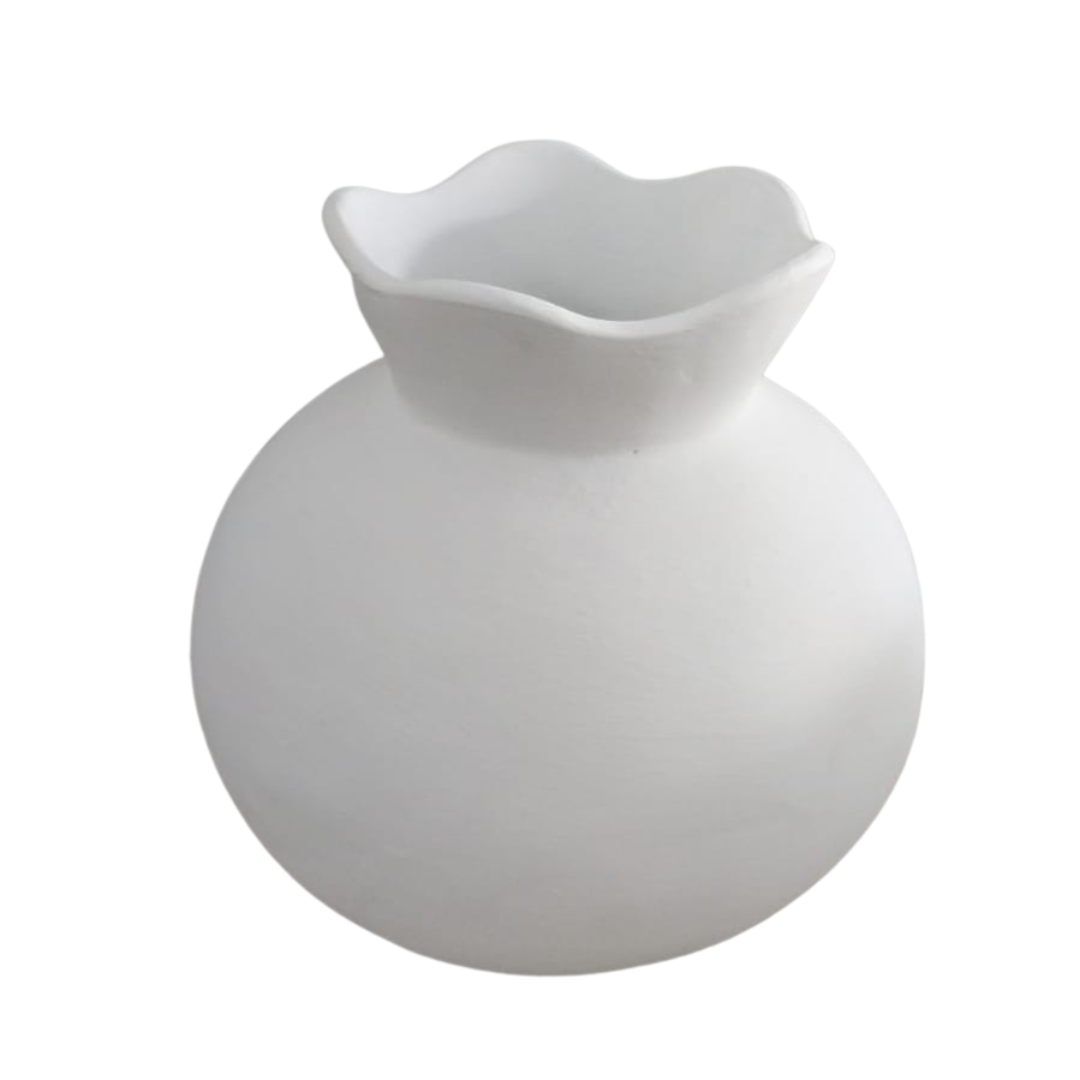A white ceramic vase with a beveled edge, suitable for holding flowers or other decorations.